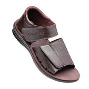Brown sandal with a strap on a white background
