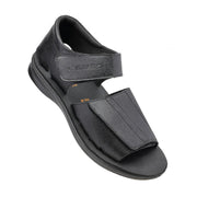 Black sandal with a strap on a white background